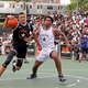 Josh Christopher(in white) hoops It up at the SLAM Summer Classic at Dyckman Park in New York City In 2018.